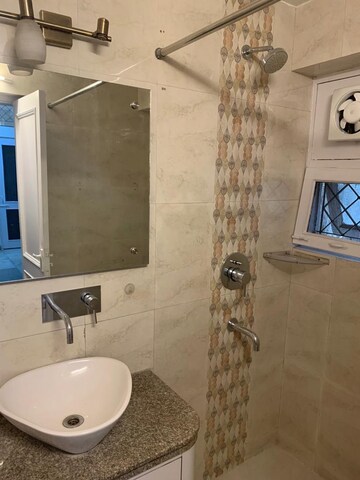 Bathroom in 3 BHK Apartment at Vasant Kunj – for Sale