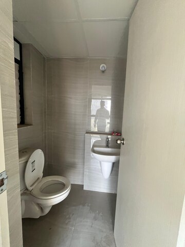 Bathroom in 1.5 BHK Apartment at Runwal Gardens Phase I, Dombivli East – for Rent