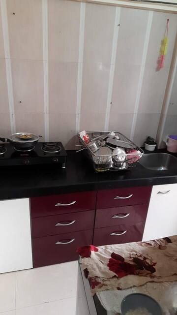 Kitchen in 1 BHK Apartment at Ideal Enclave, Mira Road – for Sale