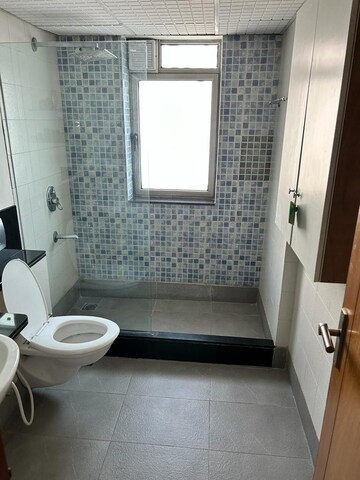 Bathroom in 4 BHK Apartment at Tata Raheja Raisina Residency, Sector 59 – for Sale