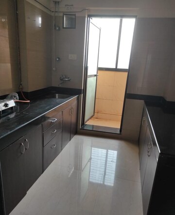 Kitchen in 2 BHK Apartment at K Raheja Heights, Malad East – for Rent