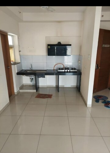 Kitchen in 1 BHK Apartment at The Chatterjee The Crown Greens, Hinjewadi – for Sale