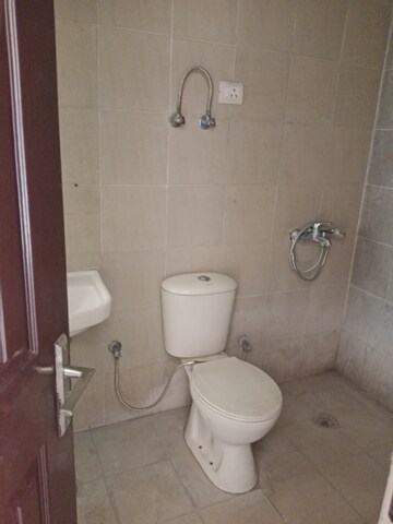 Bathroom in 2 BHK Apartment at Ajnara Integrity, Raj Nagar Extension – for Rent