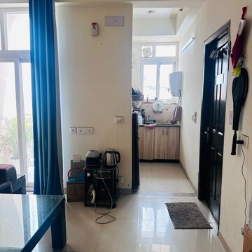 Living Room in 1.5 BHK Apartment at Raj Nagar Extension – for Rent