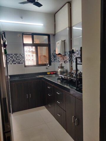 Kitchen in 1 BHK Apartment at Ram Pushpanjali Residency, Owale – for Sale