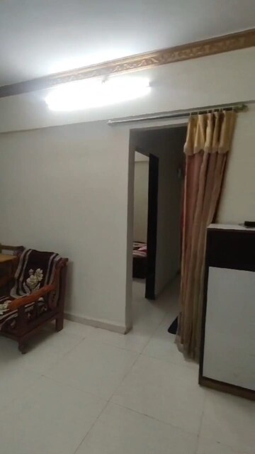 Living Room in 2 BHK Apartment at Yashwant Arcade, Kopar Khairane – for Rent