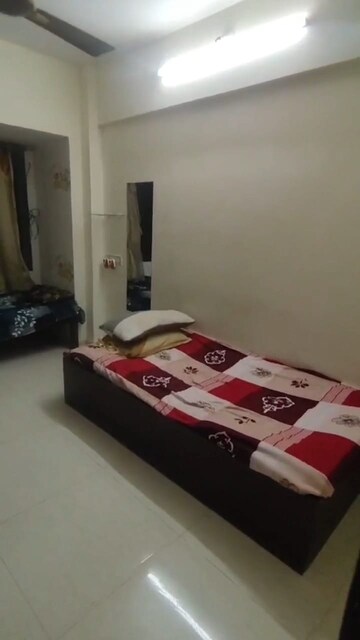 Bedroom in 2 BHK Apartment at Yashwant Arcade, Kopar Khairane – for Rent