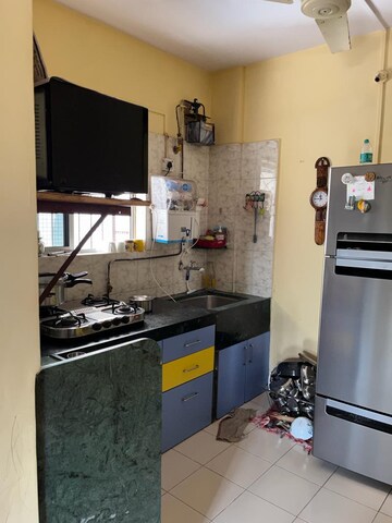 Kitchen in 2 BHK Apartment at Shri Suvarna Apartment, Kothrud – for Rent