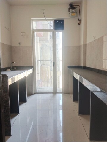 Kitchen in 1.5 BHK Apartment at Marathon Nexzone Aster, New Panvel – for Rent