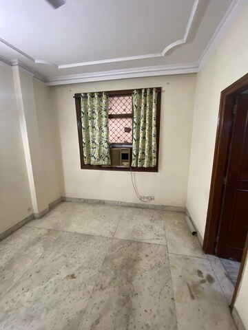 Bedroom in 2 BHK Builder Floor at East Of Kailash – for Rent