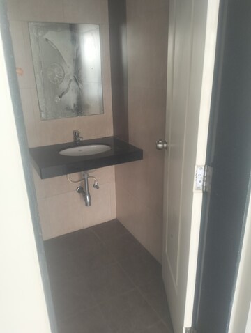 Bathroom in 2 BHK Apartment at Rama Celestial City, Ravet – for Rent