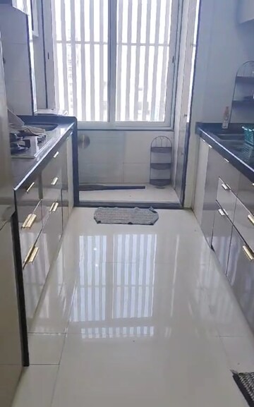 Kitchen in 2 BHK Apartment at Shreeji Atlantis, Malad West – for Rent