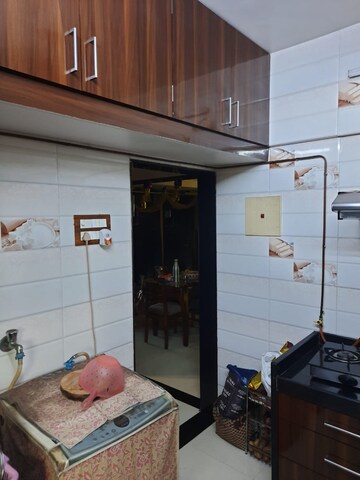 Kitchen in 1 BHK Apartment at Shree Saraswati CHS, Kopar Khairane – for Sale