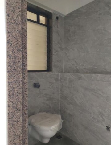 Bathroom in 1 BHK Apartment at DGS Sheetal Usha, Malad West – for Rent