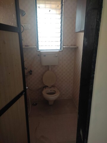 Bathroom in 1 BHK Apartment at Jay Nagar CHS, Malad West – for Rent