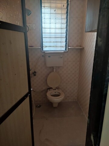Bathroom in 1 BHK Apartment at Jay Nagar CHS, Malad West – for Rent