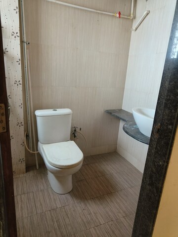 Bathroom in 1 BHK Apartment at Ajmera Yogidham Emerald, Kalyan West – for Rent