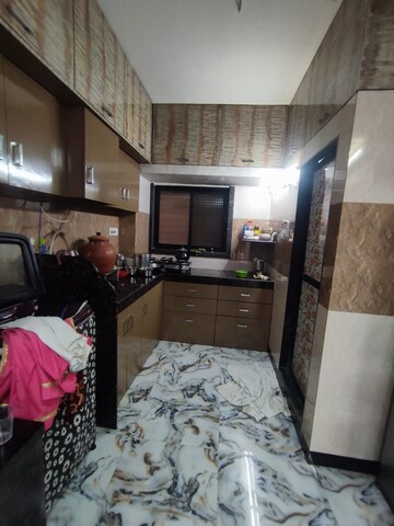 Bedroom in 4 BHK Apartment at Dattatray Niwas, Kopar Khairane – for Sale