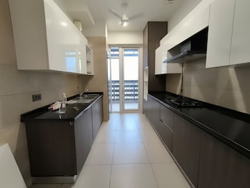 Kitchen in 4 BHK Apartment at Mahindra Luminare, Sector 59 – for Rent
