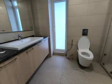 Bathroom in 4 BHK Apartment at Mahindra Luminare, Sector 59 – for Rent