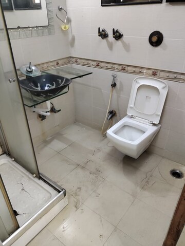 Bathroom in 4 BHK Apartment at Seawoods – for Rent