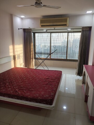 Bedroom in 4 BHK Apartment at Seawoods – for Rent