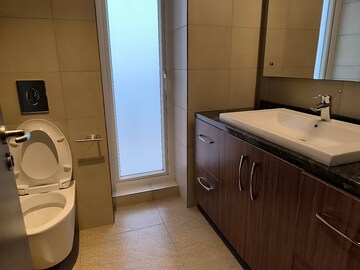 Bathroom in 4 BHK Apartment at Mahindra Luminare, Sector 59 – for Rent