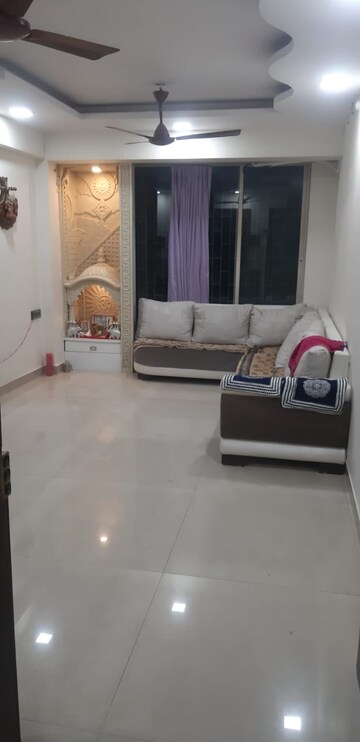 Living Room in 2 BHK Apartment at Chamunda Kesar Paradise, Seawoods – for Sale