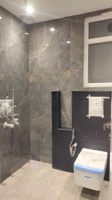 Bathroom in 4 BHK Builder Floor at Surajmal Vihar – for Rent