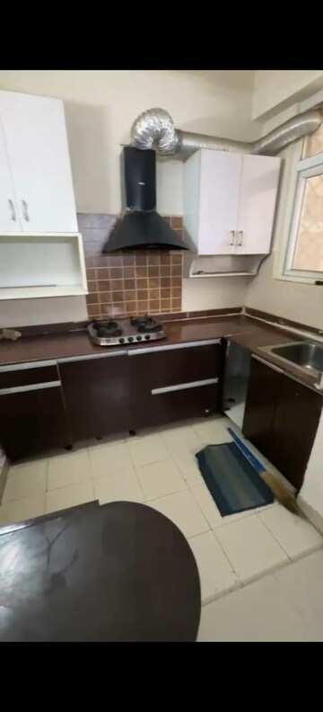 Kitchen in 2.5 BHK Apartment at Amrapali Zodiac, Sector 120 – for Rent