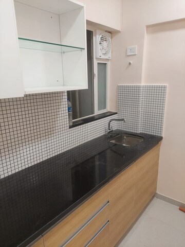 Kitchen in 2 BHK Apartment at Omkar Signet, Malad East – for Rent