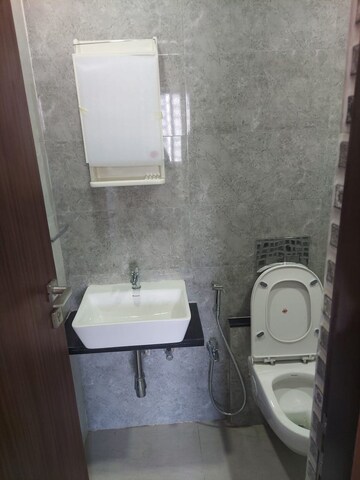 Bathroom in 2 BHK Apartment at Omkar Signet, Malad East – for Rent