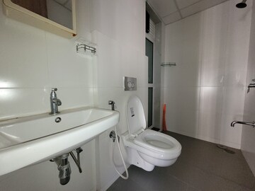 Bathroom in 1 BHK Apartment at Lodha Crown Quality Homes, Majiwada – for Rent