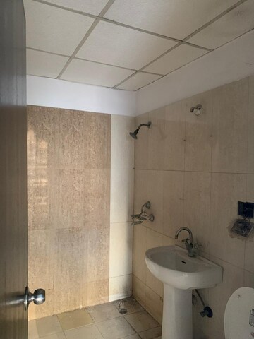 Bathroom in 1 BHK Apartment at Aditya Urban Casa, Sector 78 – for Rent