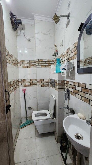Bathroom in 3 BHK Builder Floor at Dwarka Mor – for Rent