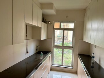 Kitchen in 1 BHK Apartment at Puraniks City Reserva, Ghodbunder Road – for Rent
