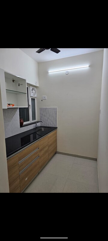 Kitchen in 1 BHK Apartment at Omkar Signet, Malad East – for Rent