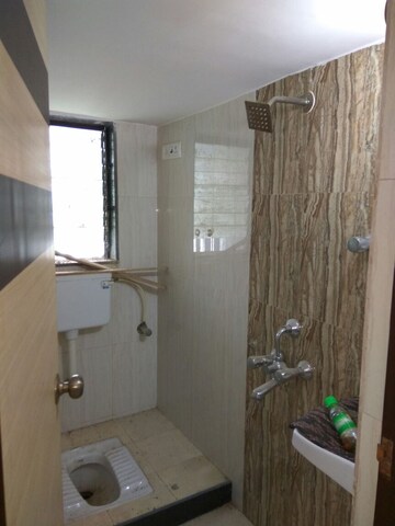 Bathroom in 2 BHK Apartment at RR Hill Galaxy, Mira Road – for Sale