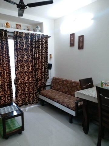 Living Room in 1 BHK Apartment at Vihang Valley Phase 2, Kasarvadavali – for Rent