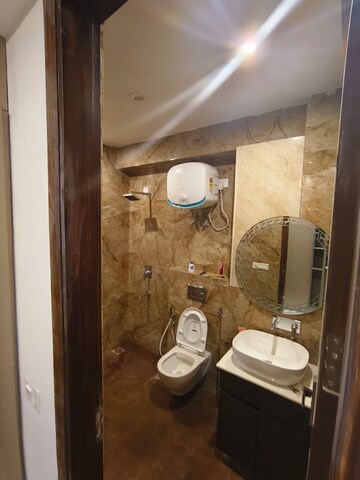 Bathroom in 4 BHK Builder Floor at RWA Surya Vihar, Sector 21 – for Rent