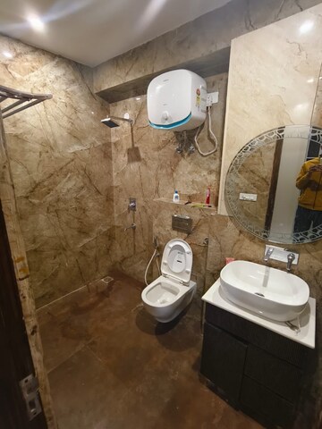 Bathroom in 4 BHK Builder Floor at RWA Surya Vihar, Sector 21 – for Rent
