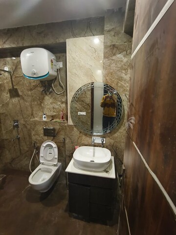 Bathroom in 4 BHK Builder Floor at RWA Surya Vihar, Sector 21 – for Rent