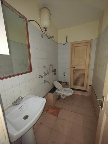 Bathroom in 2 BHK Apartment at NRI Complex Phase I, Seawoods Sector 58 – for Sale