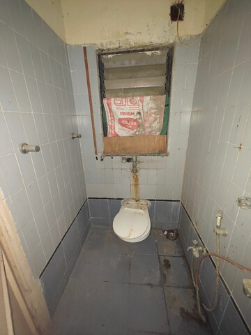 Bathroom in 2 BHK Apartment at NRI Complex Phase I, Seawoods Sector 58 – for Sale