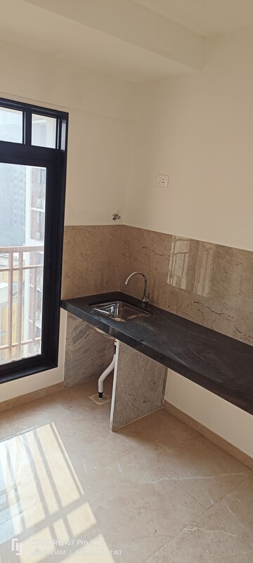 Kitchen in 1 BHK Apartment at MICL Monteverde, Dahisar East – for Sale