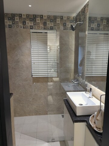 Bathroom in 3 BHK Apartment at Maxxus Elanza, International Airport Road – for Rent