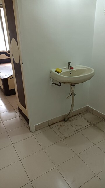 Bathroom in 1 BHK Apartment at Vardhaman Township, Hadapsar – for Rent