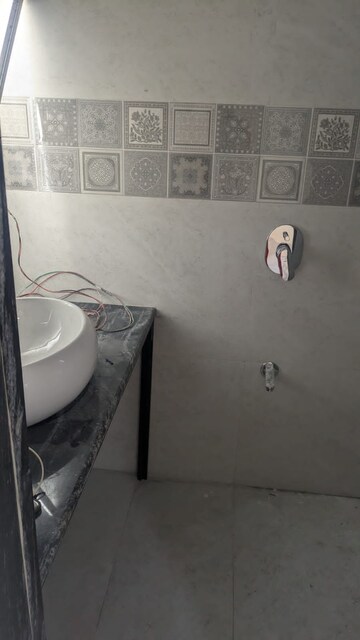Bathroom in 2.5 BHK Apartment at Gundecha Symphony, Andheri West – for Sale