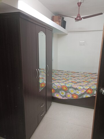 Bedroom in 2 BHK Apartment at Panchsheel Gardens, Kandivali West – for Sale