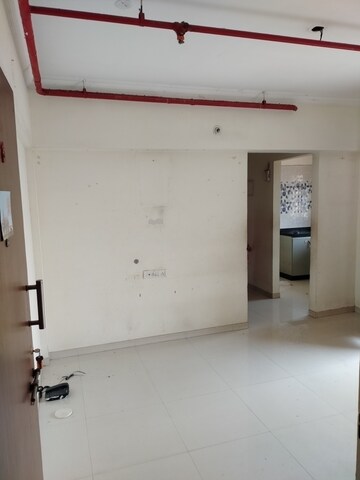 Room in 2 BHK Apartment at Raunak City Sector 4, Kalyan West – for Sale